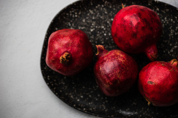 Fototapeta na wymiar Ripe pomegranate fruits