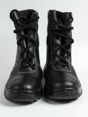 Work leather shoes isolated on white background. Safety gear.