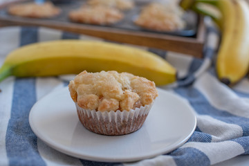 Homemade banana muffins on the wooden table
