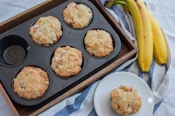 Homemade banana muffins on the wooden table