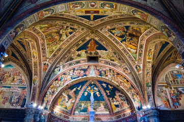 Fototapeta na wymiar Siena, Italy - CIRCA 2013: Baptistery of Saint John (Battistero di San Giovanni) ceiling interior in Siena Cathedral complex.