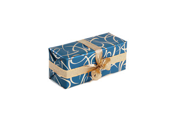 packaged rectangular gift in blue packaging with gold bow and gold pattern on the white background