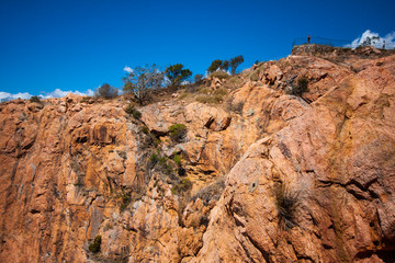 Scenic view at the Castle Hill Lookout at Townsville (Queensland, Australia) to the cliff, viewing platform, hill's summit.