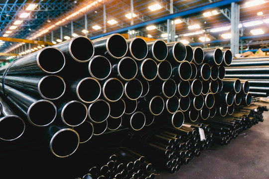 high quality Galvanized steel pipe or Aluminum and chrome stainless pipes in stack waiting for shipment  in warehouse