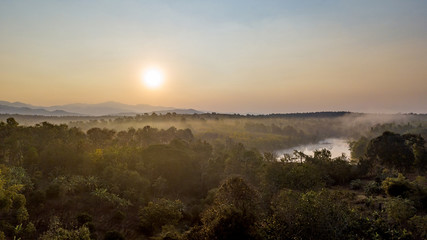 Panorama view of countryside forest and mountains when sunrise. Panoramic image.