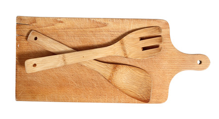 Wooden cutting board with spatula. Isolated with clipping path.