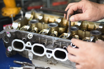 Old tools , Mechanic using Taps and Dies tool making Internal and External Threads nut in engine...