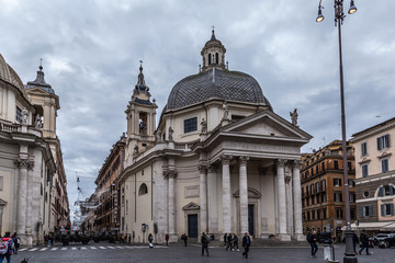 Fototapeta na wymiar People's Square ( Piazza del Popolo ), Churches of Santa Maria in Montesanto and Santa Maria dei Miracoli, Rome architecture and landmark, in Rome, Italy
