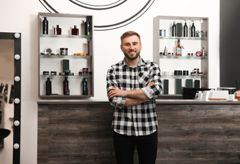 Young business owner in his barber shop