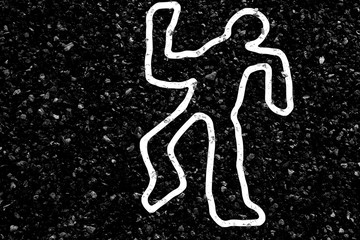 Silhouette de corps humain sur asphalte 