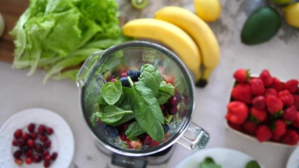 Top View Of Spinach Smoothie With Fruits And Berries