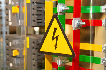  high voltage sign on a modern electric shield. Industry