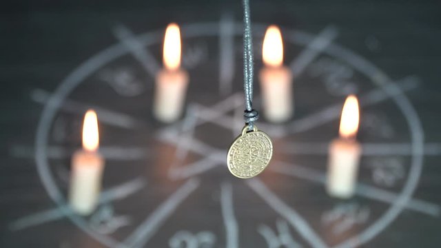 amulet of predictions on the background of the magic circle. helps in exchanging information with parallel worlds and foreseeing the future, serves to develop intuition. 
