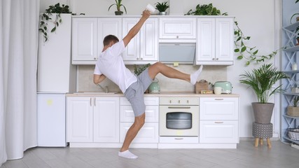 Good Morning With Excited Funny Man Dancing In Kitchen At Home - obrazy, fototapety, plakaty