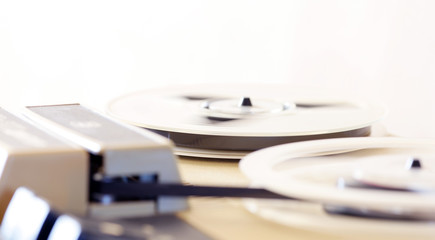 old bobbin tape player with magnetic tape