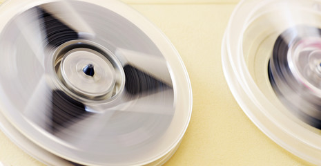 old bobbin tape player with magnetic tape