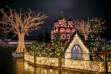 Moscow, Russia, Varvarka street. Christmas decorations and illuminations at night on the background of the Znamensky Cathedral - 317894065