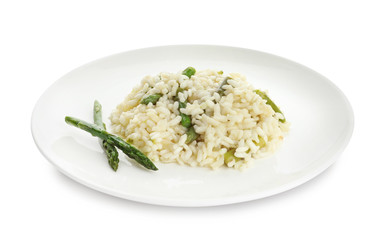 Delicious risotto with asparagus isolated on white