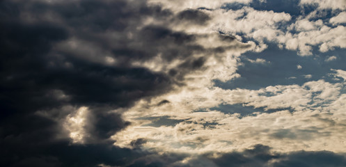 Obraz premium gray Cumulus clouds in a blue sky