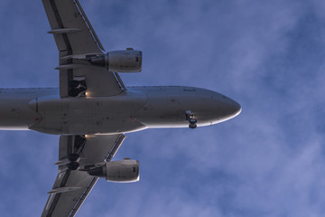 Close view to landing passenger jet