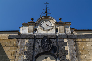 Renaissance town gate with clock in Anguillara Sabazia, Italy
