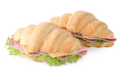 Tasty croissant sandwiches with ham isolated on white