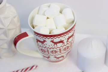 cup of coffee with cream on wooden background