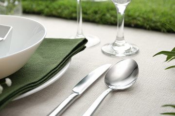 Elegant cutlery with on table, closeup. Festive setting