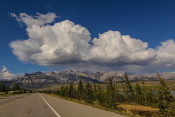 Highway in Rocky mountains Canada Alberta scenic drive with mountain view top 7 drives in the world Rockies sunny day with cloud 