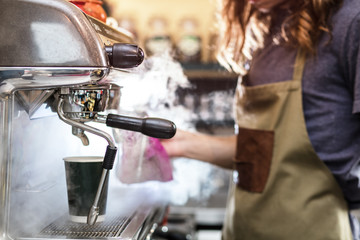 Barista is making coffee