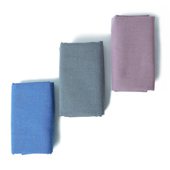 Fabrics lay with space for copy isolated on white