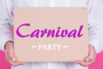 man holding in his hands poster or banner with carnival text