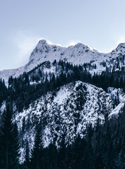 The Italian Alps, at sunset, after a snowfall, near the town of Ardesio, Italy - December 2019.