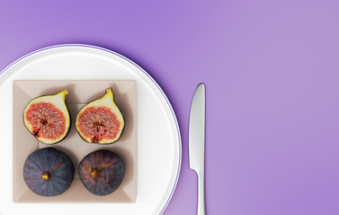 Sliced figs top view on violet background concept. Copy space colorful tableware minimal idea. 