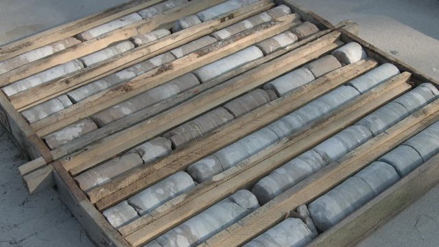 Drill core geological rock samples in wooden box