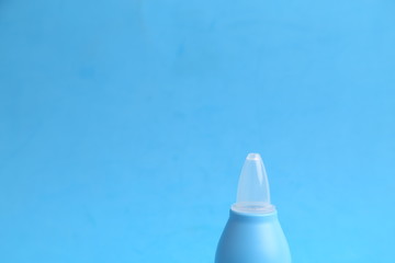 nasal aspirator for babies in colored background