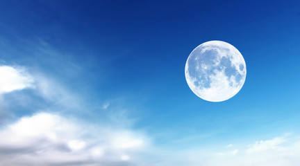 Naklejka na ściany i meble Blue sky with clouds and moon, natural background.