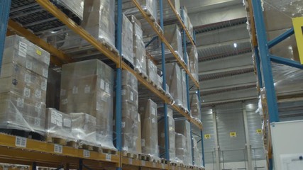 Tilt up of high rack in industrial warehouse