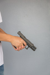 The man holding Pistol. Gun - 317917012
