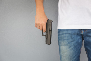 The man holding Pistol. Gun - 317917029