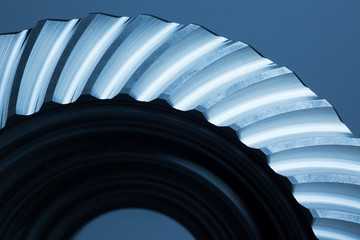 Close-up of an cock wheel on blue background