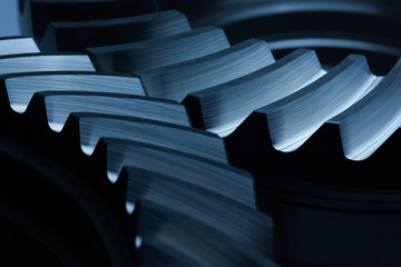 Close-up of cock wheels with blue light