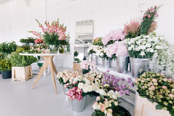 bouquets of flowers on a background of light wall