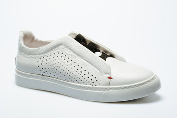 white leather shoes on a white background