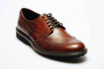 brown leather shoes on a white background