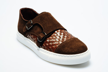 brown leather shoes on a white background