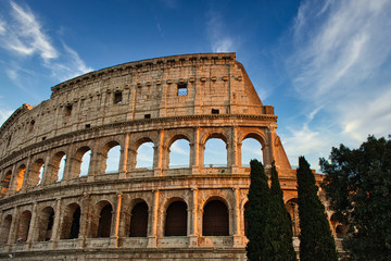 Fototapeta na wymiar Historical monument in Rome, Colosseum in the afternoon whit cloud sky in the background