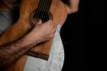 Hands on the guitar