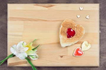 Obraz na płótnie Canvas Sweet heart shaped sandwich bread with red berry jam, butter and banana. Creative breakfast for kids, Valentine's day or Mother's day recipe. Homemade food with love. Set photo 05 of 5