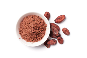 Cocoa powder and beans in white bowl